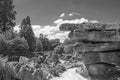 Beautiful landscape of large rock boulders with a dramatic sky background in black and white Royalty Free Stock Photo