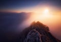 Beautiful landscape, misty fog on mountain slopes. Abstract view with sun