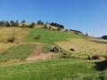 Beautiful landscape of mountain Kopaonik in Serbia, small house on green field, rural scene, majestic pitoresque view. Royalty Free Stock Photo