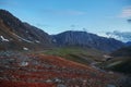 Beautiful landscape of mountain peaks, rivers and lakes. Wild nature of Altai Mountains. Clouds over mountain ranges. Russia,