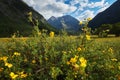 Beautiful landscape of mountain peaks, rivers and lakes. Wild nature of Altai Mountains. Clouds over mountain ranges. Russia,