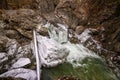 Landscape with a mountain river with small waterfalls in winter day in the canyon Royalty Free Stock Photo