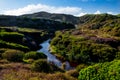 Beautiful landscape of the mountain and stream with blue sky and cloud