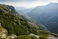 A beautiful landscape of mountains with bushes, rocks and a blue river on a summer day. Sulak Canyon Royalty Free Stock Photo