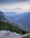 A beautiful landscape of mountains with bushes, rocks and a river on a summer day at sunset. Sulak Canyon Royalty Free Stock Photo