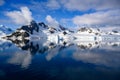 Antarctic landscape with mountains, glacier and iceberg oin dark blue water of Lemaire Channel near Paradise Bay, Antarctica Royalty Free Stock Photo