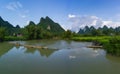 Beautiful landscape of mountains with green rice field and river pass at the Phong Nam village in Cao Bang, Vietnam Royalty Free Stock Photo