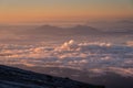 Beautiful landscape of mountains layer and cloud in a morning sunrise. Scenic view from Kinabalu mountain massif in Borneo island Royalty Free Stock Photo