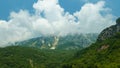 beautiful landscape in the mountains of Montenegro, the movement of clouds, a bright sunny day, a forest on the hillsides