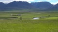 Beautiful landscape of mountains in Qinghai, China. Sunny blue sky with clouds. Stunning view of Tibetan Plateau. Royalty Free Stock Photo