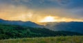 Beautiful landscape in the mountains at sunset. View of colorful sky with amazing clouds. Scenic View Of Silhouette Mountain Royalty Free Stock Photo