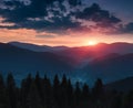 Beautiful landscape in the mountains at sunset. View of colorful sky with clouds and misty hills at distance. Royalty Free Stock Photo