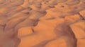 Beautiful landscape of the Namib Desert under the wing of the aircraft at sunset. Flying on a plane over the desert is Royalty Free Stock Photo