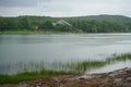 Beautiful landscape in nature and a dam with a boat in it. Asenovgrad, Plovdiv region, Europe, Bulgaria Royalty Free Stock Photo