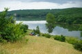 Beautiful landscape in nature and a dam with a boat in it. Asenovgrad, Plovdiv region, Europe, Bulgaria Royalty Free Stock Photo