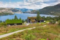 Beautiful landscape of Norway homes with green roofs and, mountainous terrain and reservoirs Royalty Free Stock Photo