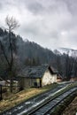 Beautiful landscape with old house by railroad Royalty Free Stock Photo