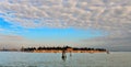 Beautiful landscape with old San Michele cemetery island in background in the Venetian Lagoon with cloudy blue sky in Venice, Ital Royalty Free Stock Photo