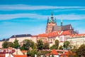 The beautiful landscape of the old town and the Hradcany Prague Castle with St. Vitus Cathedral and St. George church in Prague