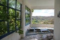 Beautiful landscape out of wide window of an abandoned hotel Royalty Free Stock Photo