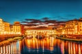 Beautiful landscape, panorama on historical view of the Florence - Ponte Vecchio is a bridge in Florence at night time. Italy Royalty Free Stock Photo