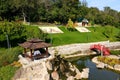 A beautiful landscape park, a lake, wooden pavilions, a red bridge in the Japanese style from Uman, Ukraine, New Sofiyivka. Aerial Royalty Free Stock Photo