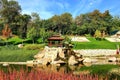 A beautiful landscape park, a lake, wooden pavilions, a red bridge in the Japanese style, Uman, Ukraine, New Sofiyivka. Garden Royalty Free Stock Photo