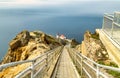 Beautiful landscape, Point Reyes lighthouse on the rocky coast of the Pacific Ocean, a long staircase leads to it. California, USA Royalty Free Stock Photo