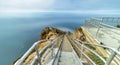 Beautiful landscape, Point Reyes lighthouse on the rocky coast of the Pacific Ocean, a long staircase leads to it. California, USA Royalty Free Stock Photo