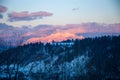 Beautiful landscape of Postavaru Mountains at sunset in a cold and sunny day during winter season Royalty Free Stock Photo