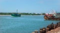 Beautiful landscape of the river arasalaru with old and new boats near karaikal beach. Royalty Free Stock Photo