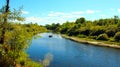 Beautiful landscape with river and canoe on it