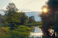 Beautiful landscape of river at sunset in summer.