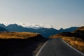 Beautiful landscape with road and mountain range silhouette in the Alps during sunset Royalty Free Stock Photo