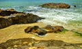 Beautiful landscape with rocks and sea waves on a beach Royalty Free Stock Photo