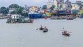 Beautiful landscape of Sadarghat river port on Buriganga river in Dhaka. Ferry boats on the river with a cloudy sky background Royalty Free Stock Photo