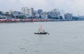 Beautiful landscape of Sadarghat river port on Buriganga river in Dhaka. Ferry boats on the river with a cloudy sky background Royalty Free Stock Photo