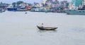 Beautiful landscape of Sadarghat river port on Buriganga river in Dhaka. Ferry boats on the river with a cloudy sky background Royalty Free Stock Photo