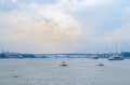 Beautiful landscape of Sadarghat river port on Buriganga river in Dhaka. Ferry boats on the river with a cloudy sky background Royalty Free Stock Photo