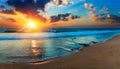 Beautiful landscape with sea sunset on beach. Bright orange sun and blue sky Royalty Free Stock Photo