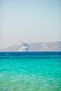 Beautiful landscape with sea view. Cruise liner at the sea near the islands. Mykonos island, Greece