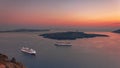 Beautiful landscape with sea view on the Sunset. Cruise liner in the Aegean Sea, Thira, Santorini island, Greece. Summer seascape Royalty Free Stock Photo