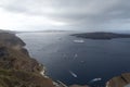 Beautiful landscape with sea views. Cruise ship in sea near NEA Kameni, a small Greek island in the Aegean sea near Santorini. Royalty Free Stock Photo