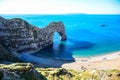 View of Durdle Door, a natural limestone arch on the Jurassic Coast near Lulworth in Dorset, England, UK Royalty Free Stock Photo