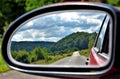 Beautiful landscape seen through the rearview mirror Royalty Free Stock Photo