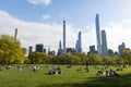 Sheep Meadow with People and the Midtown Manhattan Skyline at Central Park during Spring in New York City