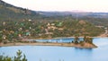 Small village with boats next to a lake in the mountains Royalty Free Stock Photo