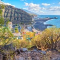 Beautiful landscape of a small colorful coastal city near the beach. Bright and vibrant town near the sea and mountain Royalty Free Stock Photo