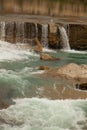 Beautiful landscape of small waterfall of city river