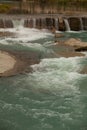 Beautiful landscape of small waterfall of city river